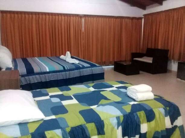 Imagen de la habitación del Hotel Peru Hosting De Punta Sal. Foto 19