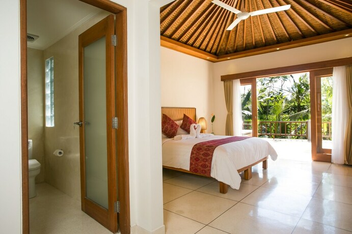Imagen de la habitación del Hotel Pesantian Villa and Warung. Foto 19