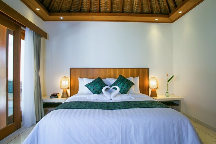 Imagen de la habitación del Hotel Pesantian Villa and Warung. Foto 23