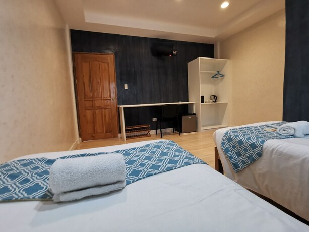 Imagen de la habitación del Hotel Pescadores Seaview Suites. Foto 13