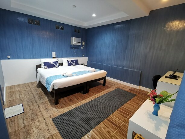 Imagen de la habitación del Hotel Pescadores Seaview Suites. Foto 16