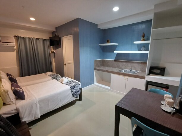 Imagen de la habitación del Hotel Pescadores Seaview Suites. Foto 19