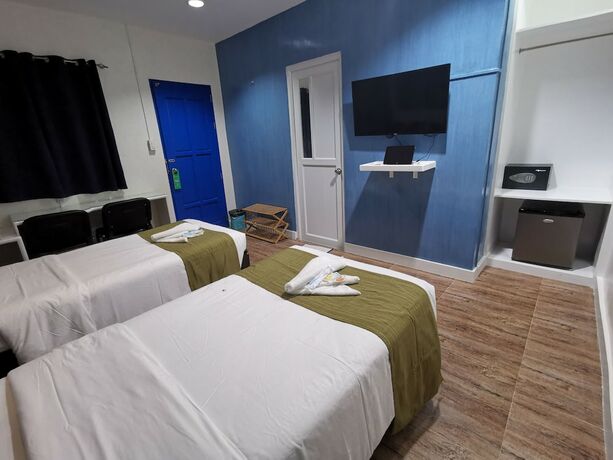 Imagen de la habitación del Hotel Pescadores Seaview Suites. Foto 20