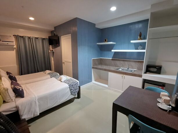 Imagen de la habitación del Hotel Pescadores Seaview Suites. Foto 24