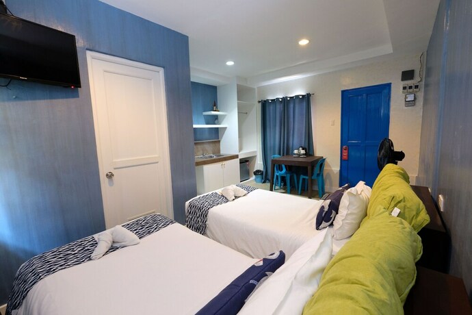 Imagen de la habitación del Hotel Pescadores Seaview Suites. Foto 25