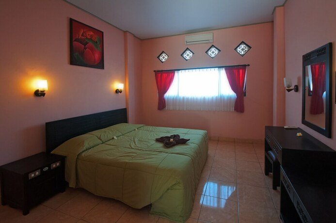 Imagen de la habitación del Hotel Pesona Beach Inn. Foto 18