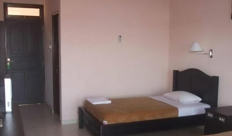 Imagen de la habitación del Hotel Pesona Beach Inn. Foto 19