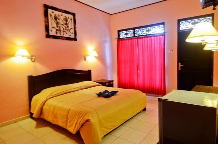 Imagen de la habitación del Hotel Pesona Beach Inn. Foto 21