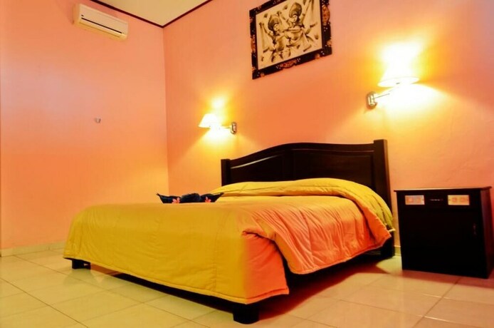 Imagen de la habitación del Hotel Pesona Beach Inn. Foto 25