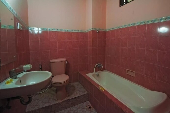 Imagen de la habitación del Hotel Pesona Beach Inn. Foto 30