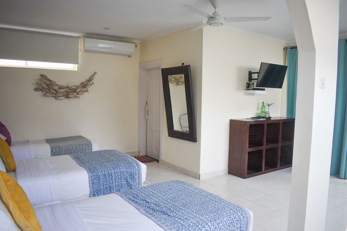 Imagen de la habitación del Hotel Pesona Beach Resort and Spa. Foto 4