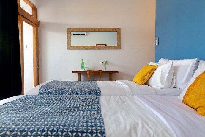 Imagen de la habitación del Hotel Pesona Beach Resort and Spa. Foto 14