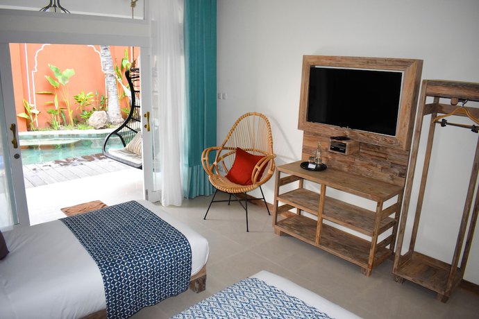 Imagen de la habitación del Hotel Pesona Beach Resort and Spa. Foto 19