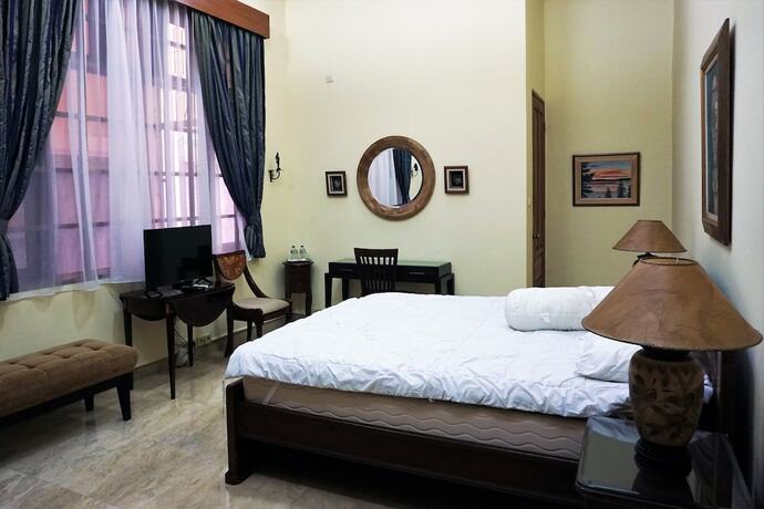 Imagen de la habitación del Hotel Pesona Guest House Jakarta. Foto 5