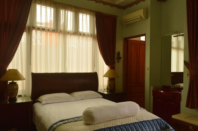 Imagen de la habitación del Hotel Pesona Guest House Jakarta. Foto 8