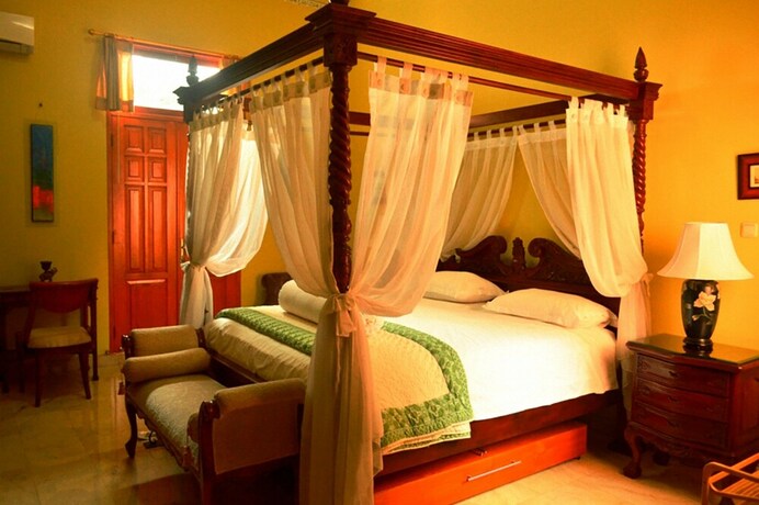 Imagen de la habitación del Hotel Pesona Guest House Jakarta. Foto 9