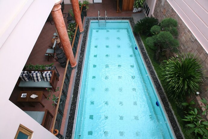 Imagen de la piscina del Hotel Pesona Guest House Jakarta. Foto 20