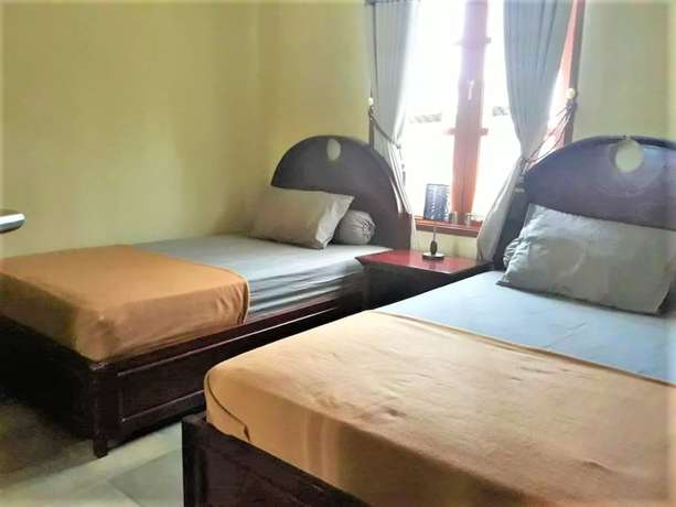 Imagen de la habitación del Hotel Pesona Nirwana Resort by Zuzu. Foto 4