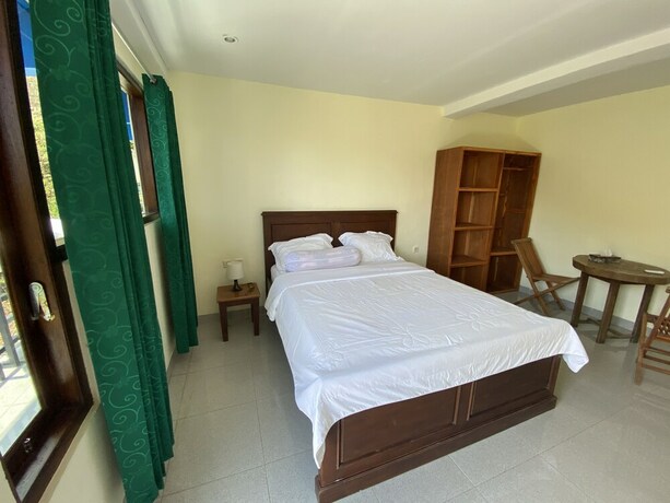 Imagen de la habitación del Hotel Pesona Restaurant and Room. Foto 28