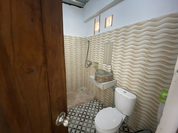 Imagen de la habitación del Hotel Pesona Restaurant and Room. Foto 30