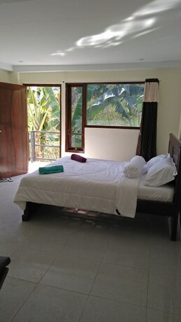 Imagen de los interiores del Hotel Pesona Restaurant and Room. Foto 33