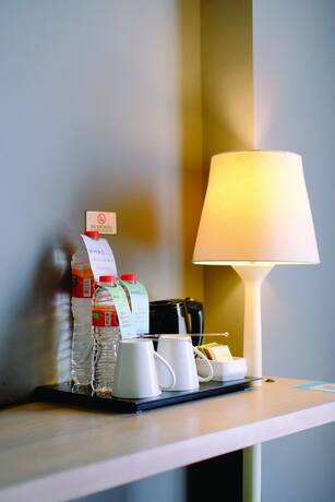 Imagen de la habitación del Hotel Pesonna Semarang. Foto 11