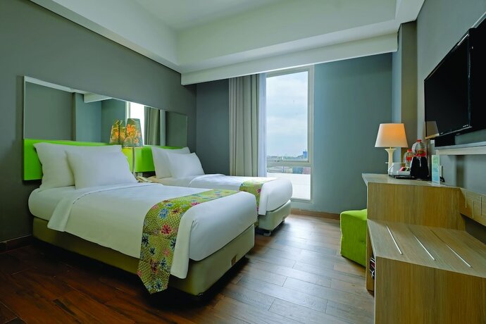 Imagen de la habitación del Hotel Pesonna Semarang. Foto 12