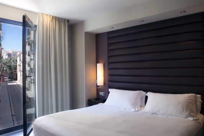 Imagen de la habitación del Hotel Pestana Arena Barcelona. Foto 11