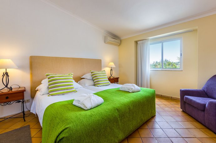 Imagen de la habitación del Hotel Pestana Palm Gardens. Foto 13