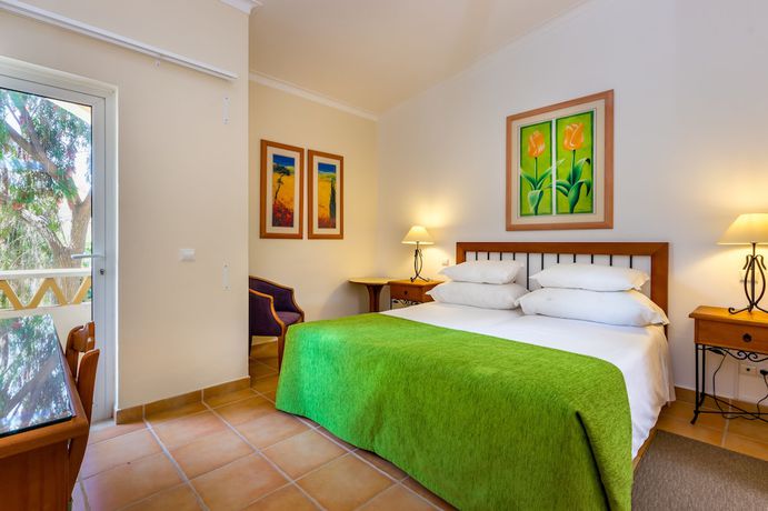 Imagen de la habitación del Hotel Pestana Palm Gardens. Foto 14