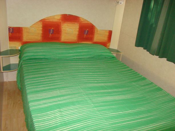 Imagen de la habitación del Hotel Pet Family Camping Cortina. Foto 2