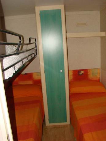 Imagen de la habitación del Hotel Pet Family Camping Cortina. Foto 15