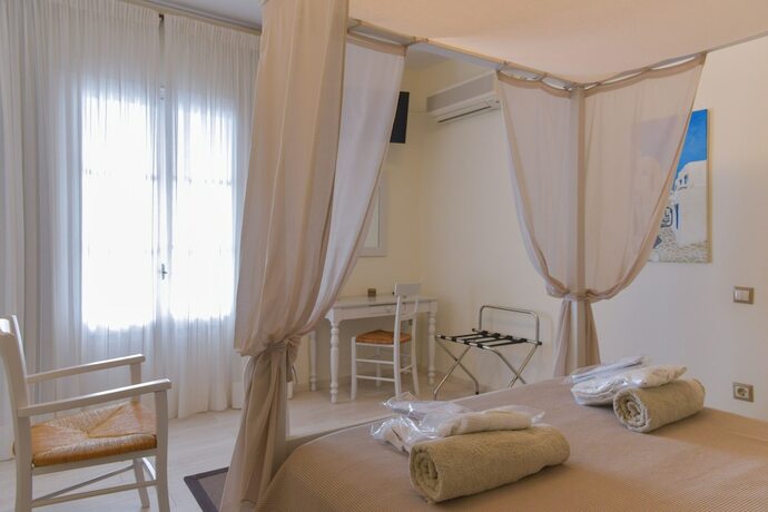 Imagen de la habitación del Hotel Petali Village. Foto 16