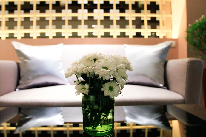Imagen de los interiores del Hotel Petals Inn. Foto 7