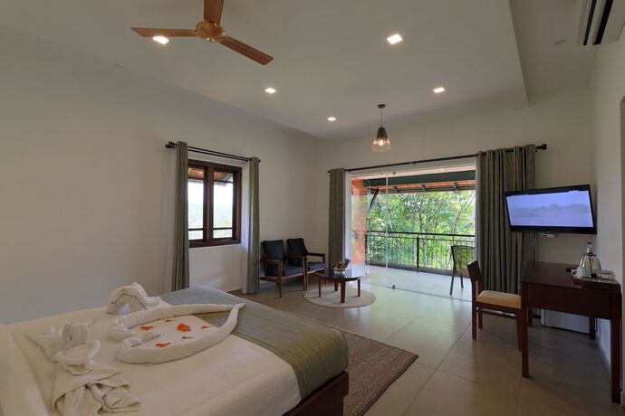 Imagen de la habitación del Hotel Petals Resorts Wayanad. Foto 13