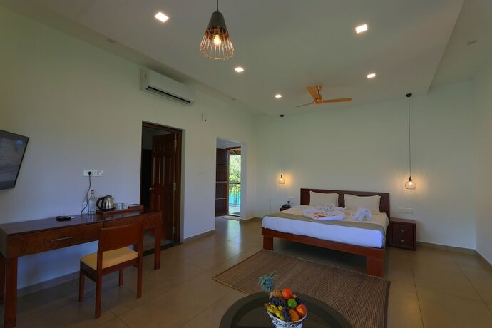 Imagen de la habitación del Hotel Petals Resorts Wayanad. Foto 14