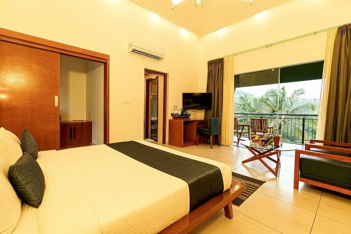 Imagen de la habitación del Hotel Petals Resorts Wayanad. Foto 19