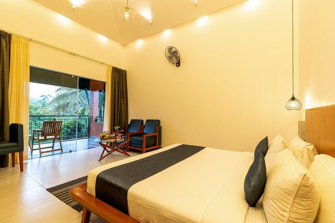 Imagen de la habitación del Hotel Petals Resorts Wayanad. Foto 20