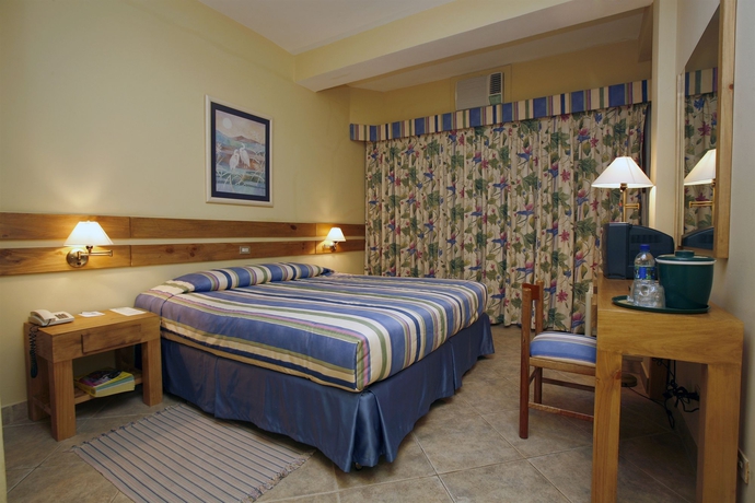 Imagen de la habitación del Hotel Peten Esplendido and Conference Center. Foto 7