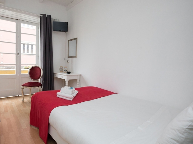 Imagen de la habitación del Hotel Peters Guesthouse - Al. Foto 17