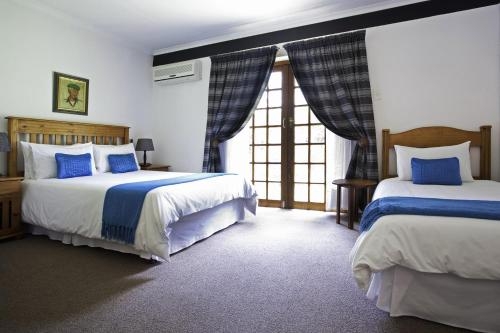 Imagen de la habitación del Hotel Peter's Guesthouse. Foto 7