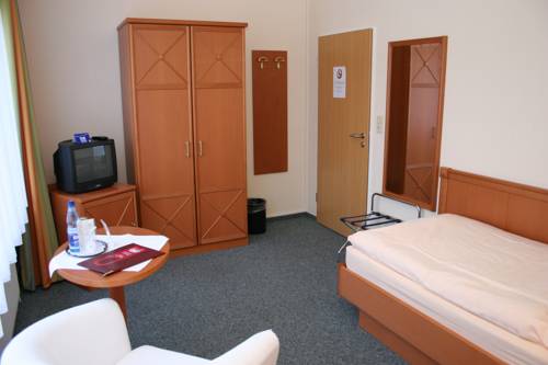 Imagen de la habitación del Hotel Petersen. Foto 11