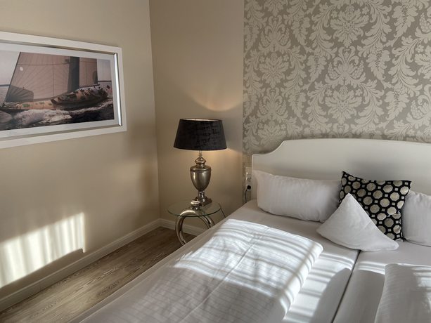 Imagen de la habitación del Hotel Petersen&lsquo;s Landhaus Scharbeutz. Foto 8