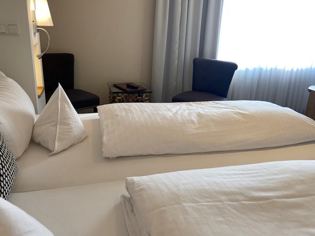 Imagen de la habitación del Hotel Petersen&lsquo;s Landhaus Scharbeutz. Foto 12