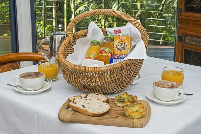 Imagen del bar/restaurante del Hotel Pethers Rainforest Retreat. Foto 6