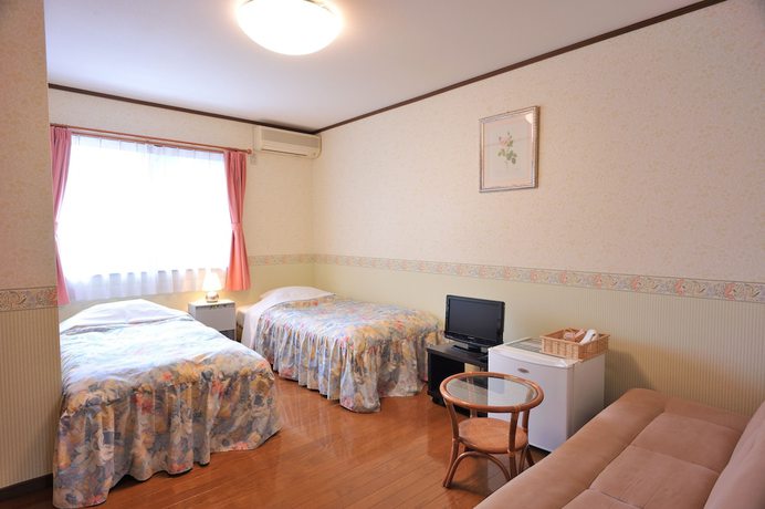 Imagen de la habitación del Hotel Petit Anise Garden. Foto 15
