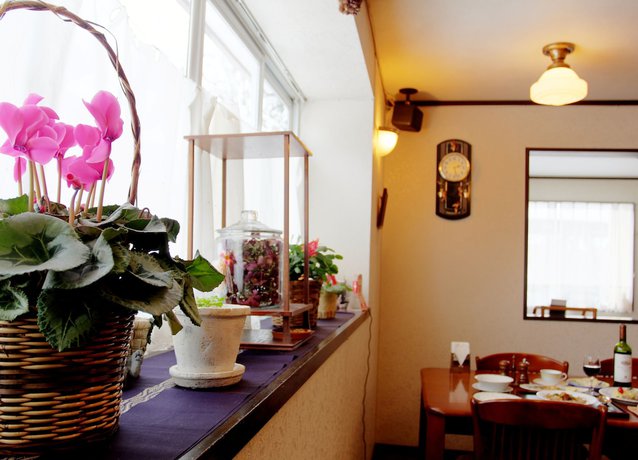 Imagen del bar/restaurante del Hotel Petit Assam. Foto 11