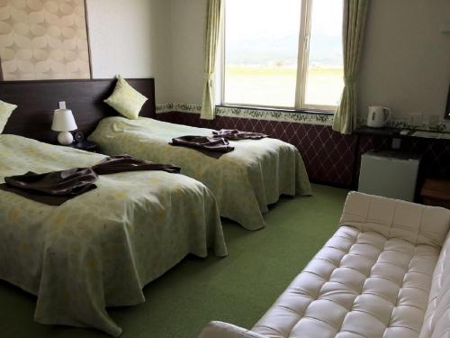 Imagen de la habitación del Hotel Petit Blanc Fleur. Foto 3