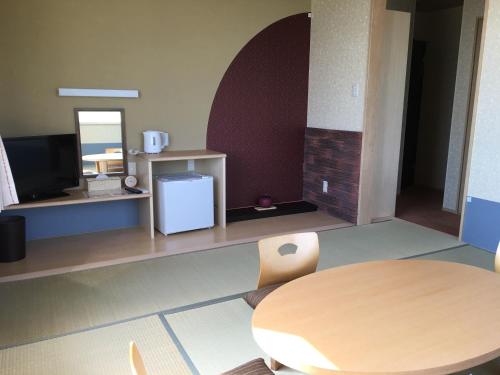 Imagen de la habitación del Hotel Petit Blanc Fleur. Foto 4