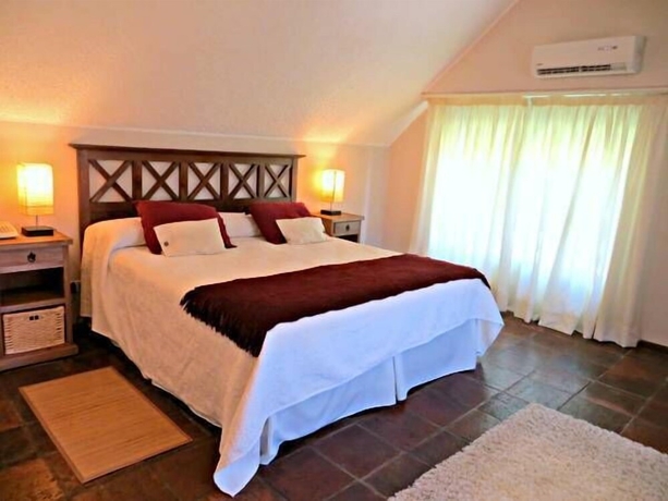 Imagen de la habitación del Hotel Petit Ch&acirc;teau Boutique. Foto 17